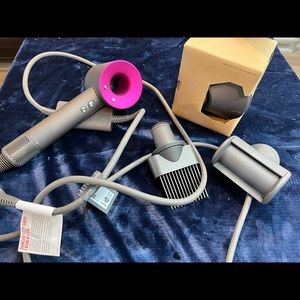 Brand New Dyson Supersonic hairdryer, iron/fuchsia